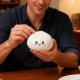 Сквиш Пельмень в коробочке, эластичная игрушка-антистресс 10 см улыбающийся пельмешка в пароварке