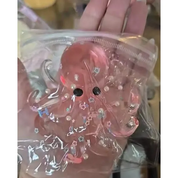 Сквиш Осьминог игрушка антистресс Осьминожка розовый эластичный Octopus с тянущимися щупальцами, игрушка мялка